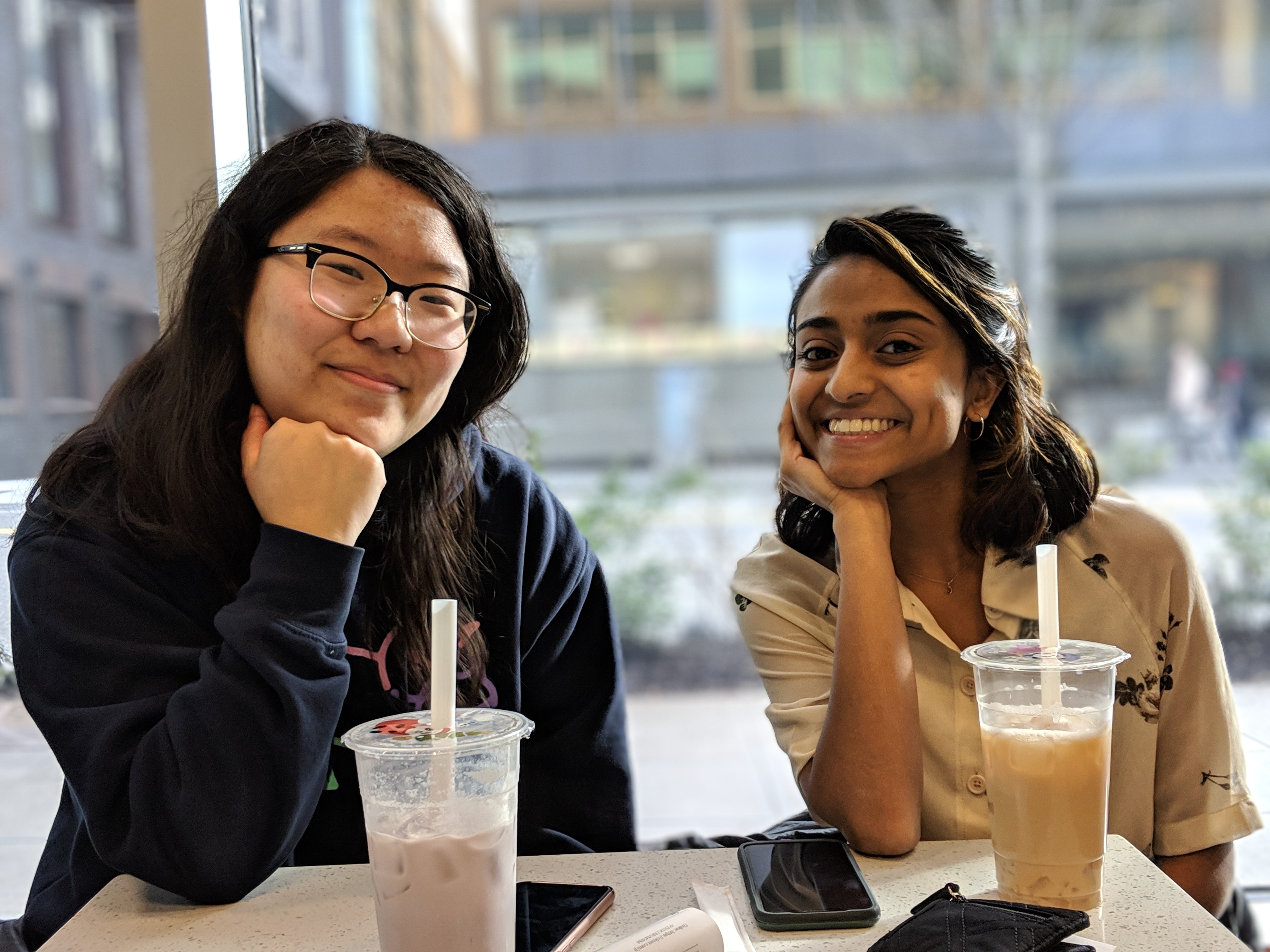 Annie and Vishaka posing with bubble tea.